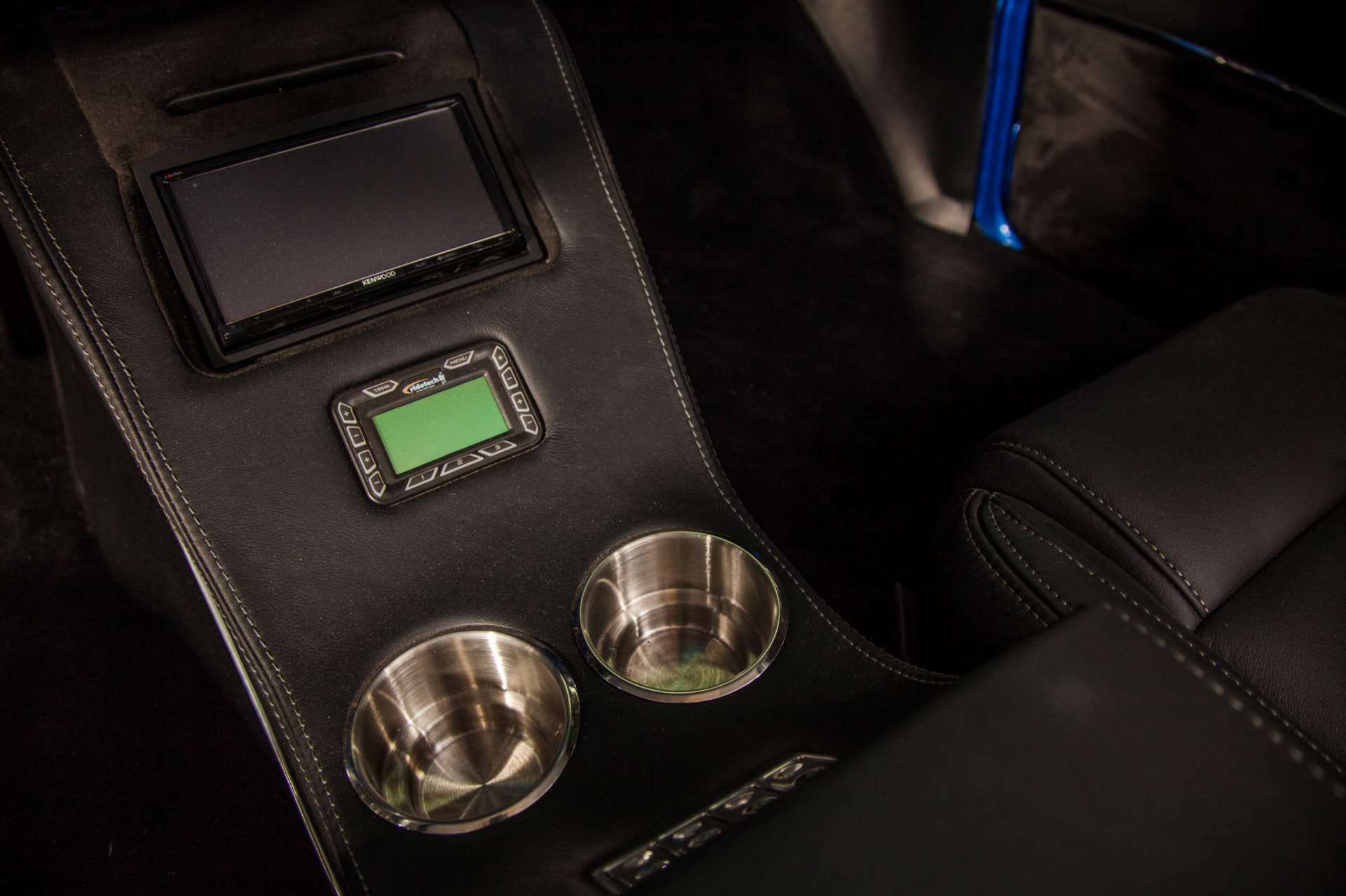 Custom center console with Kenwood screen and cup holders
