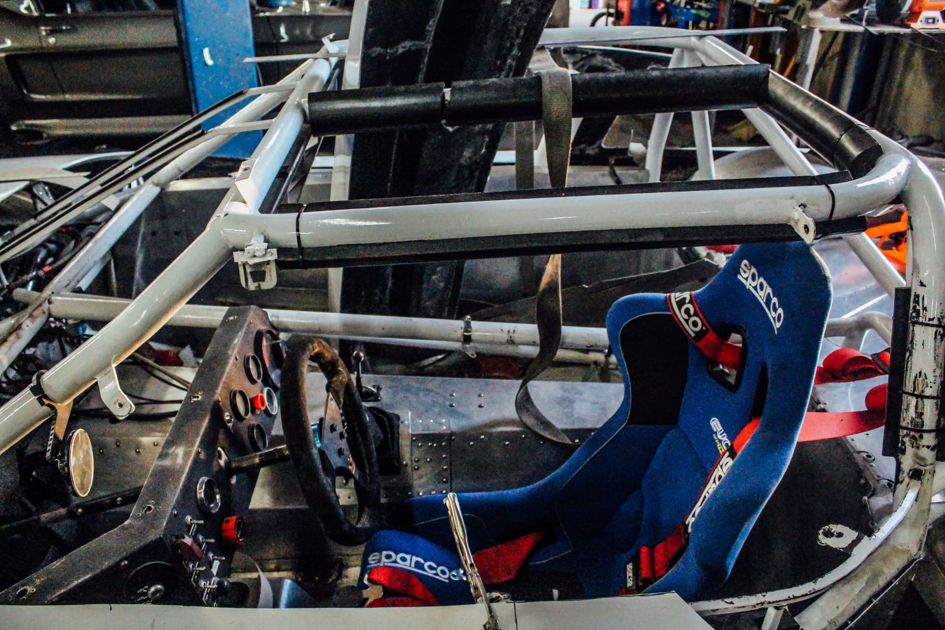 Preserved race cockpit with Sparco driver seat
