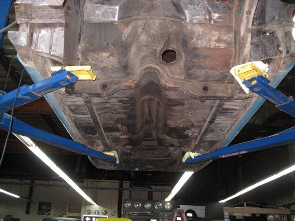 Original floor pan and underbody before restoration