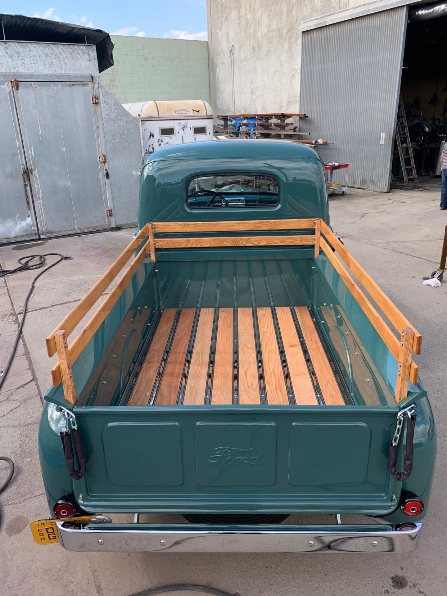 Finished wood bed and stake-side detail