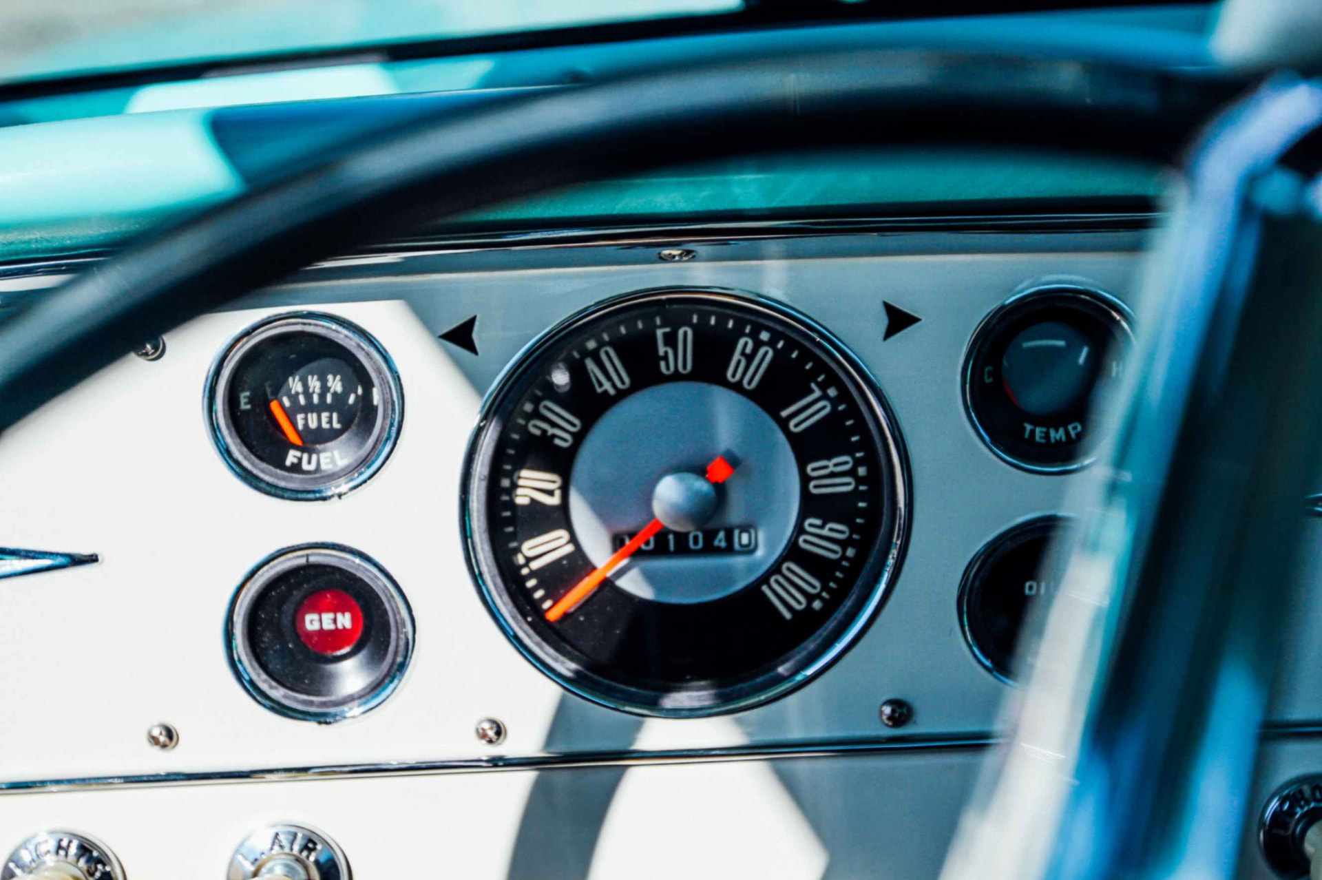 Speedometer and gauge cluster on the cream dash