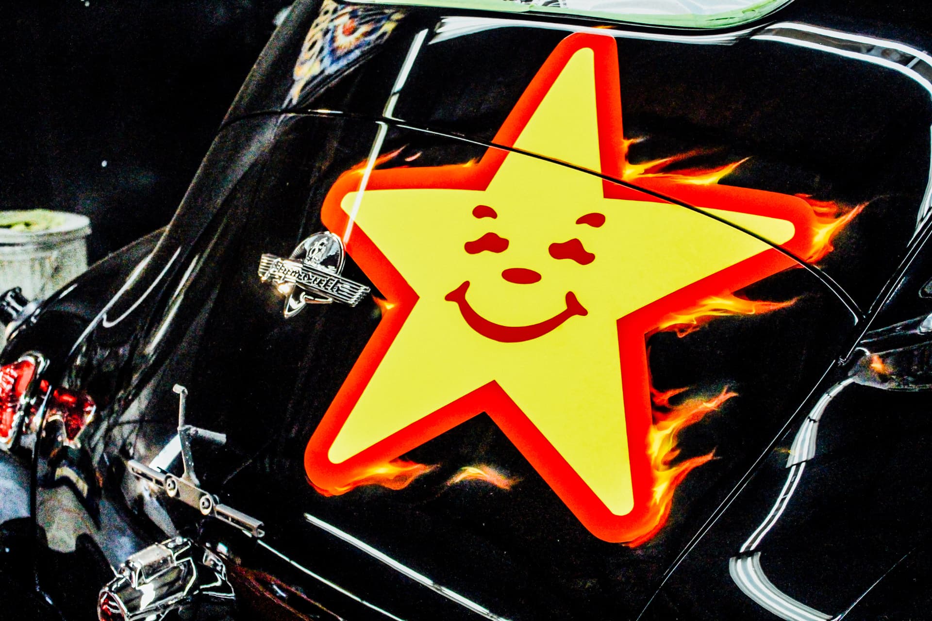 Carl's Jr. star and flame artwork