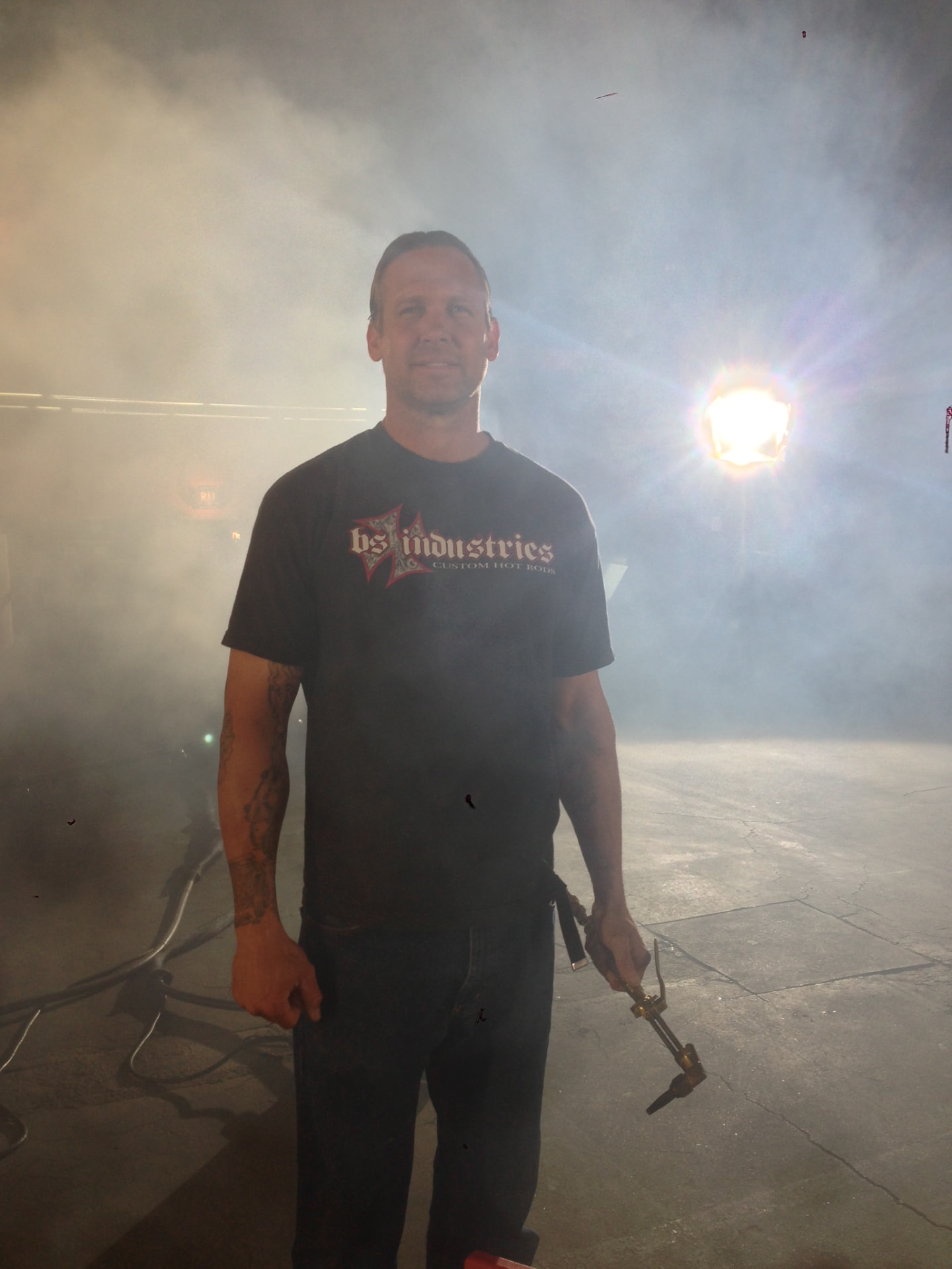 Bodie in the smoke, torch in hand