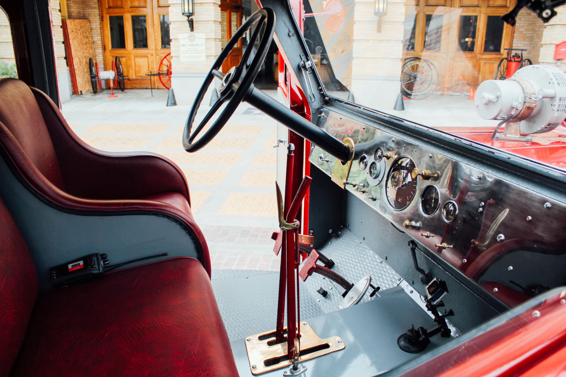 Cab interior with oxblood leather bench and polished alloy dash