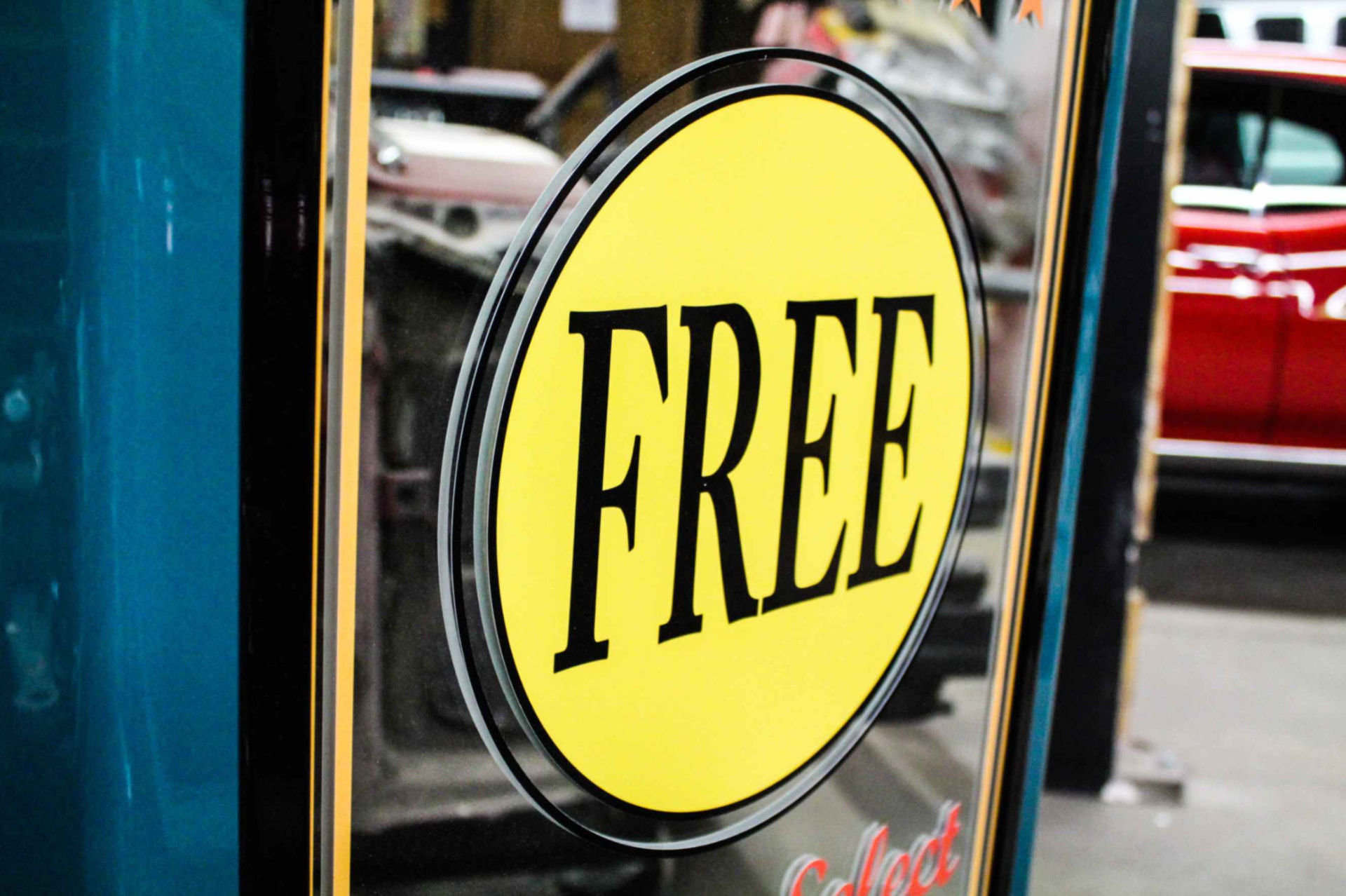 Yellow FREE emblem close-up on the mirrored panel