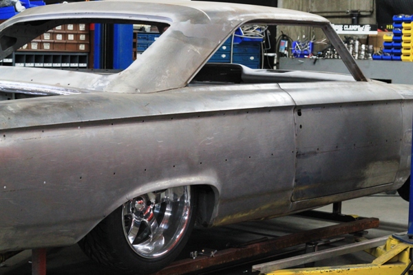 Bare metal body with wheels mocked up