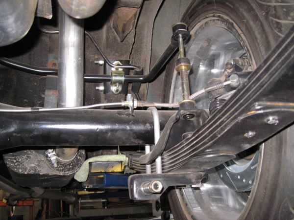 Rear suspension, leaf springs, and brake assembly during restoration