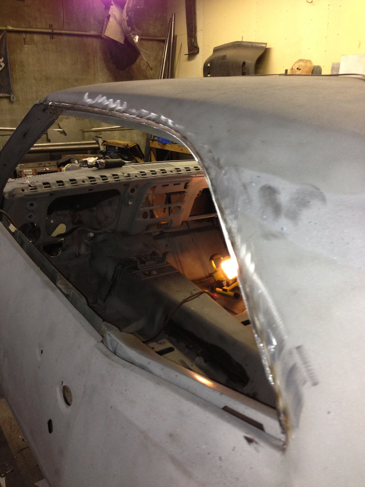 Roof and quarter-panel metalwork in progress