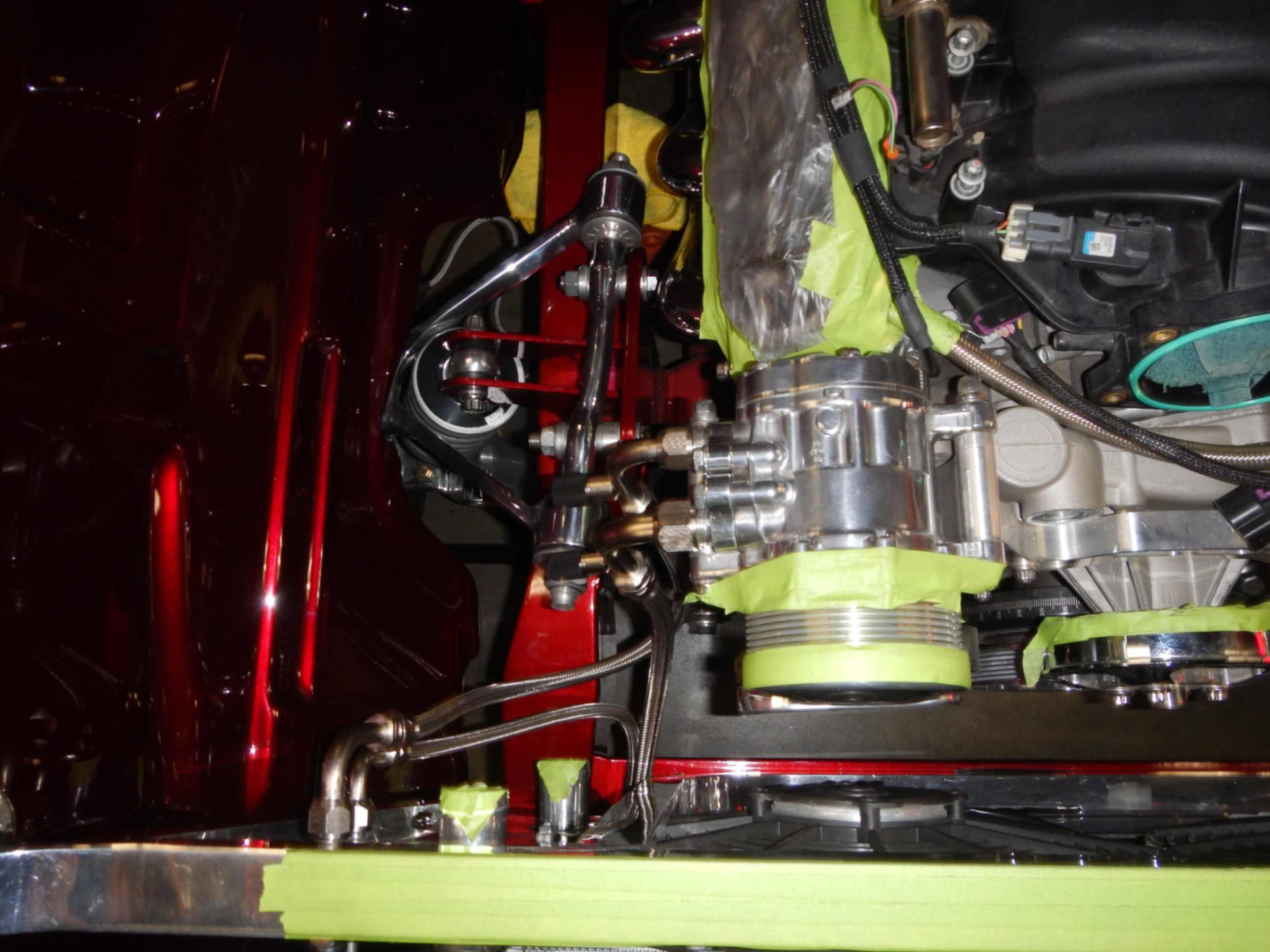 Air-conditioning compressor being fitted and plumbed