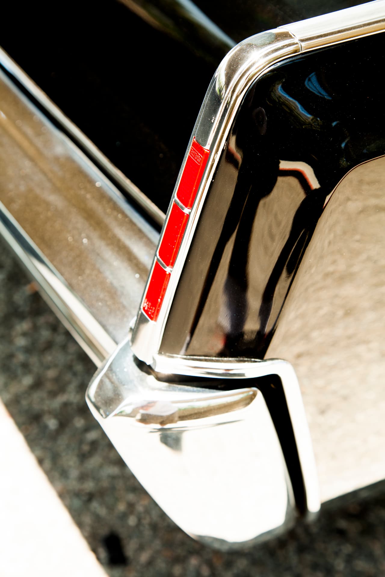 Taillight lens and bumper corner close-up