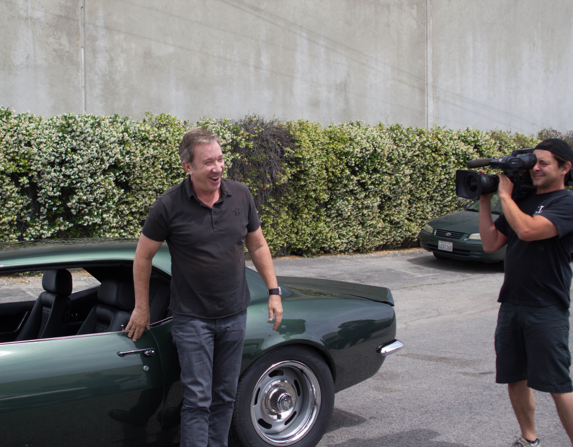 Tim Allen stepping out of the finished car
