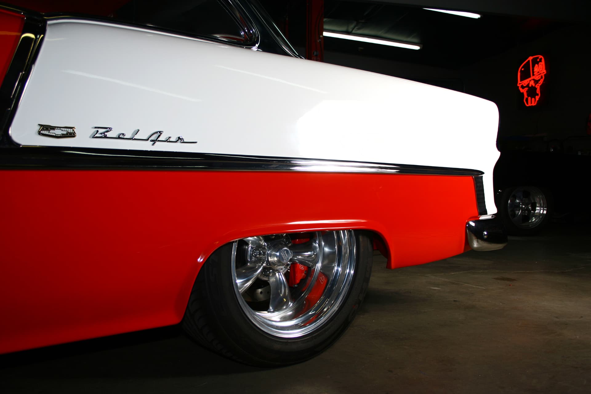 Rear quarter and polished five-spoke wheel