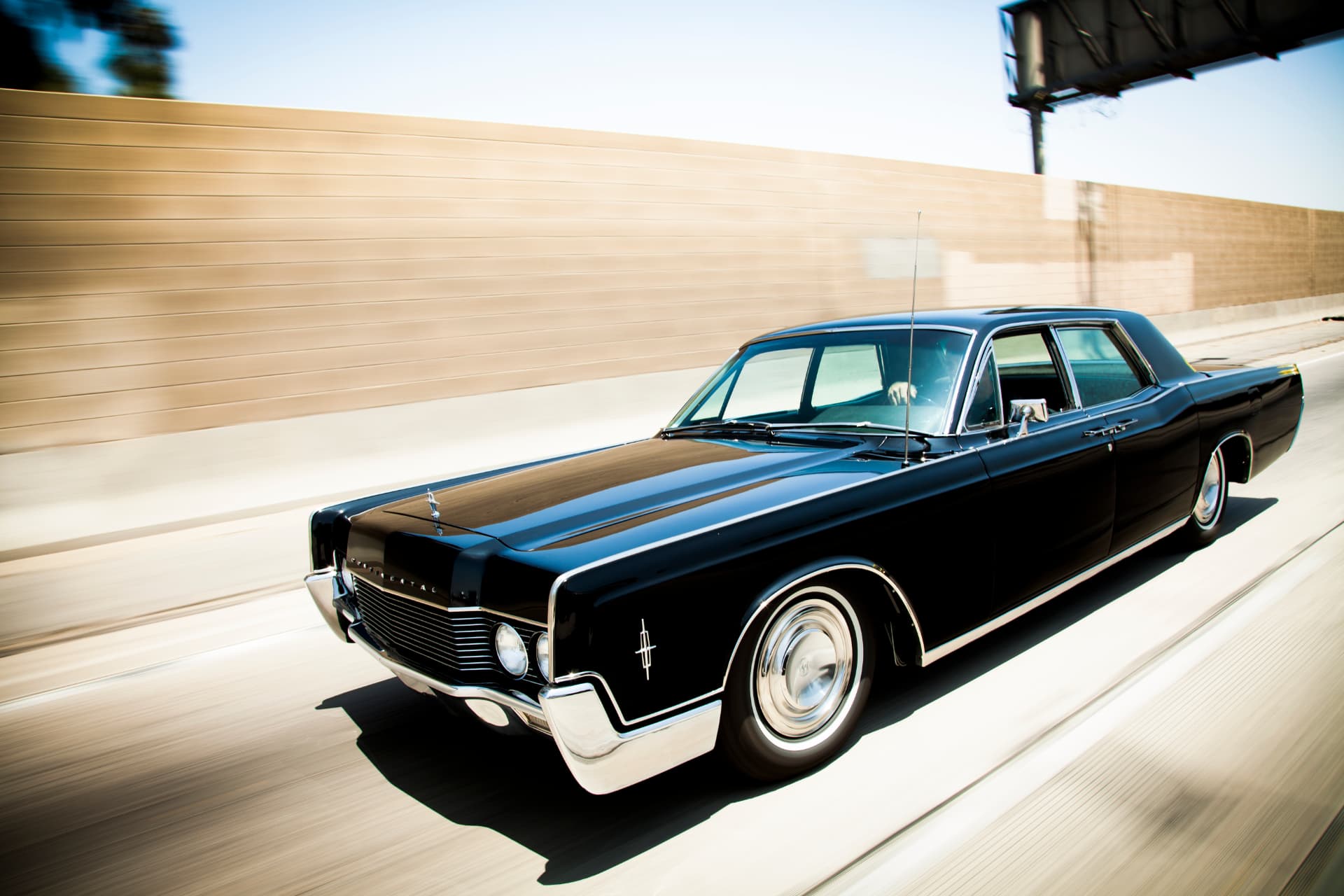 Freeway pull — front three-quarter at speed