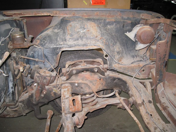 Original engine bay before restoration