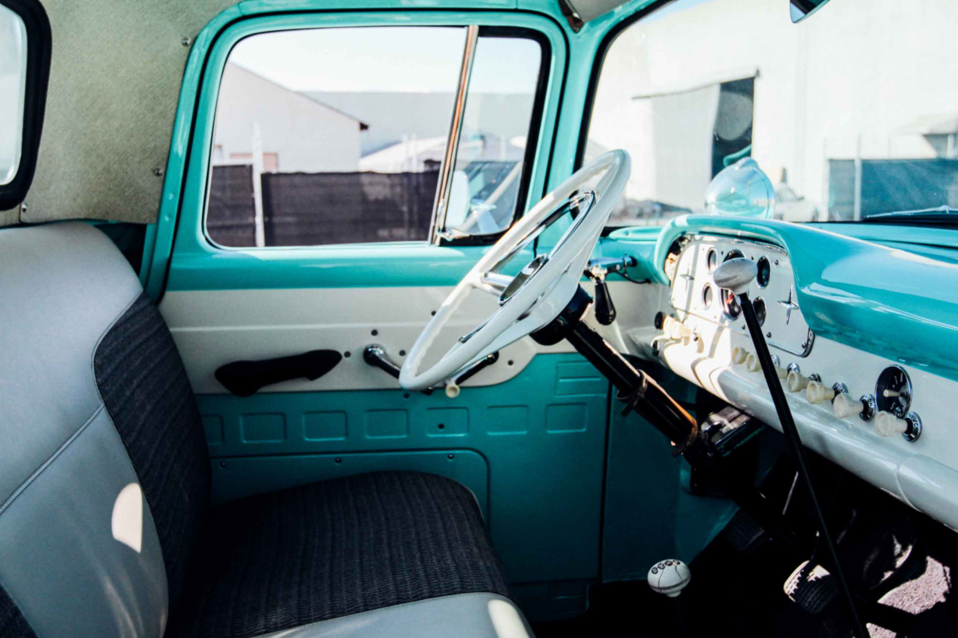 Driver-side view of the finished cab and two-tone dash