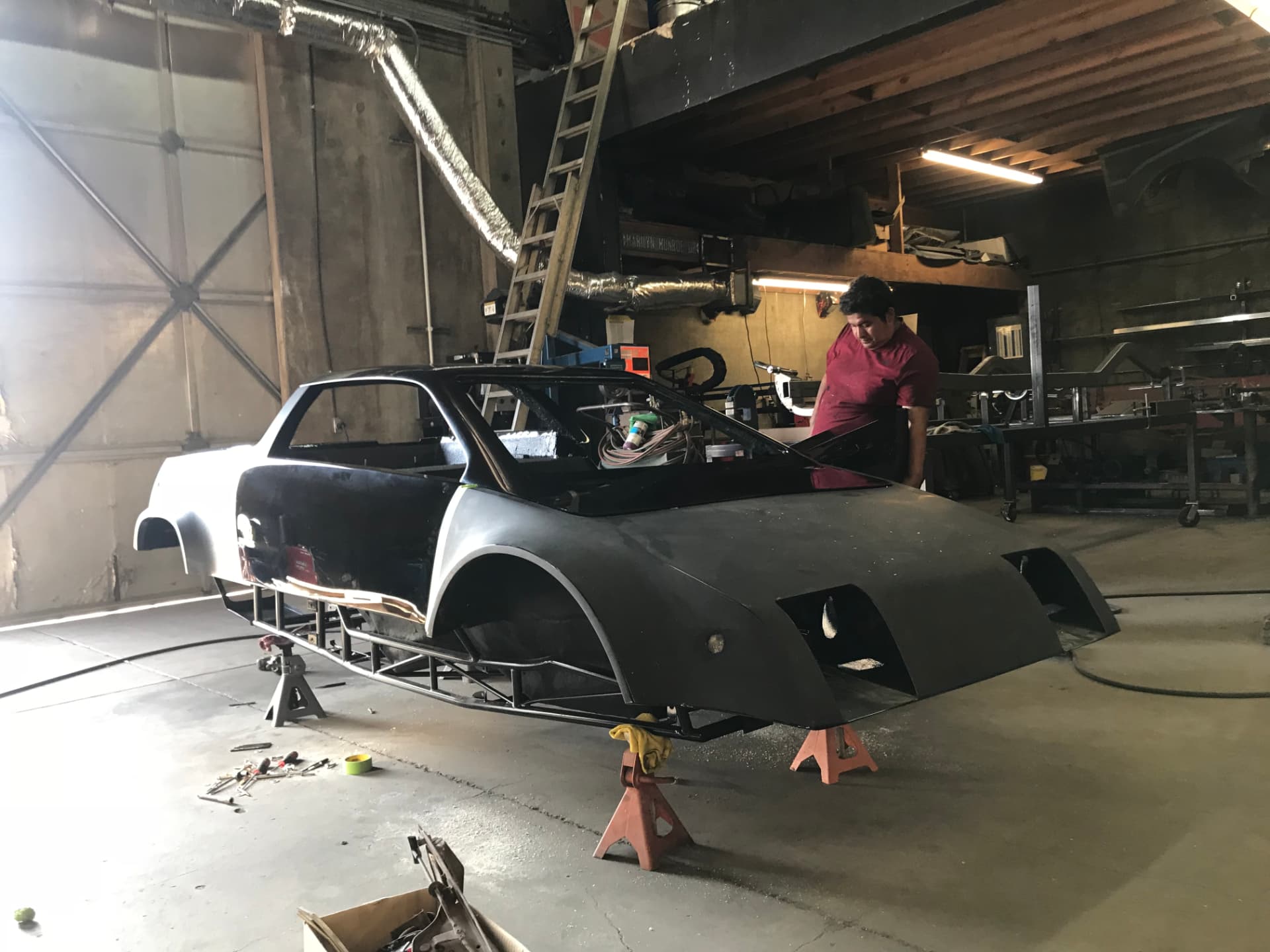Body restoration and panel fitment in the shop