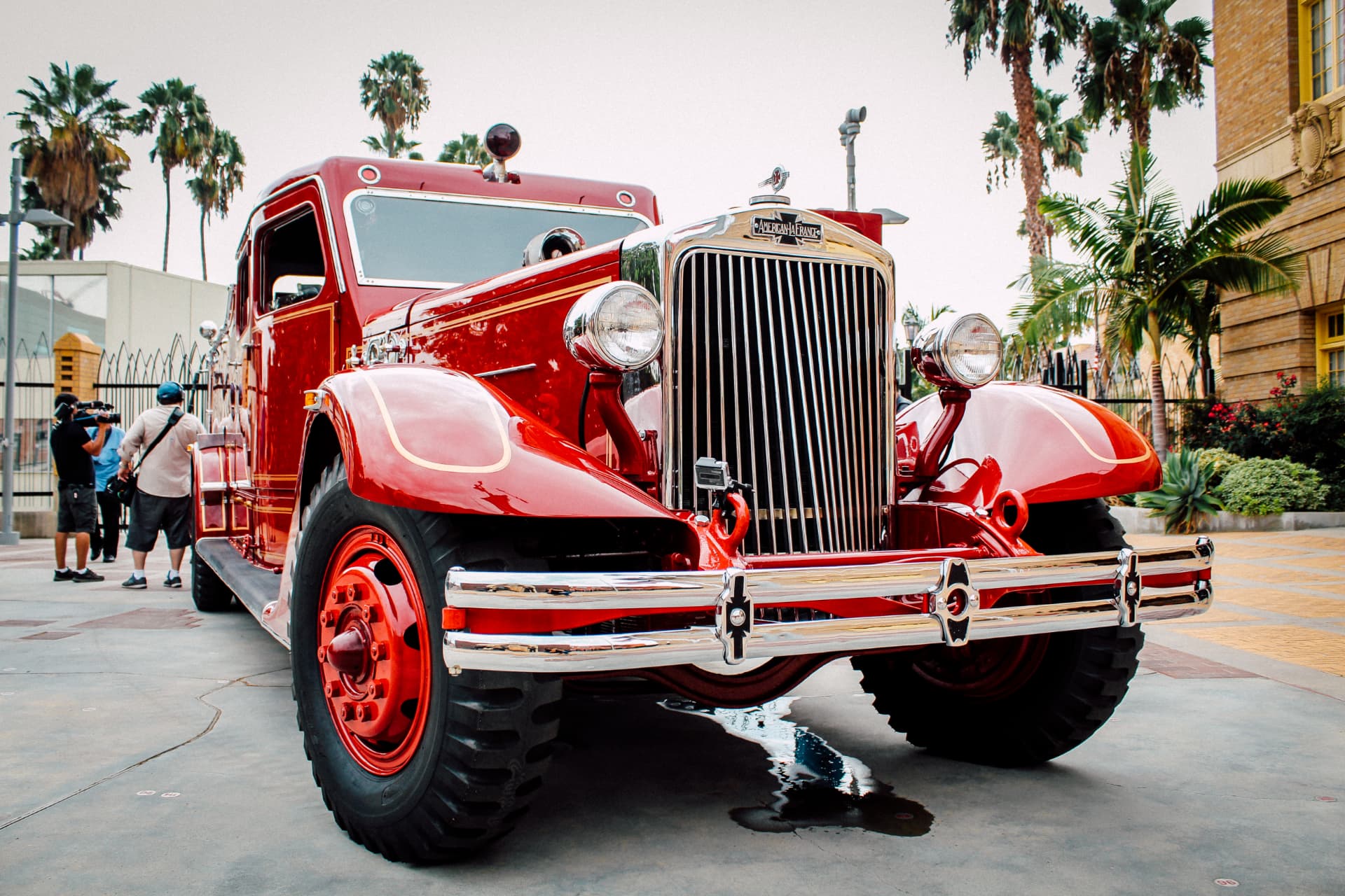 Finished at the debut — front three-quarter with chrome bumper bars and dual headlamps