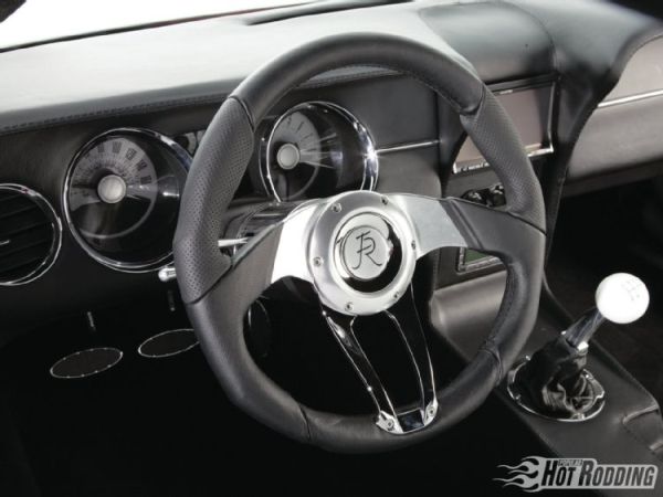 Flaming River wheel and converted 2011 Mustang GT cluster