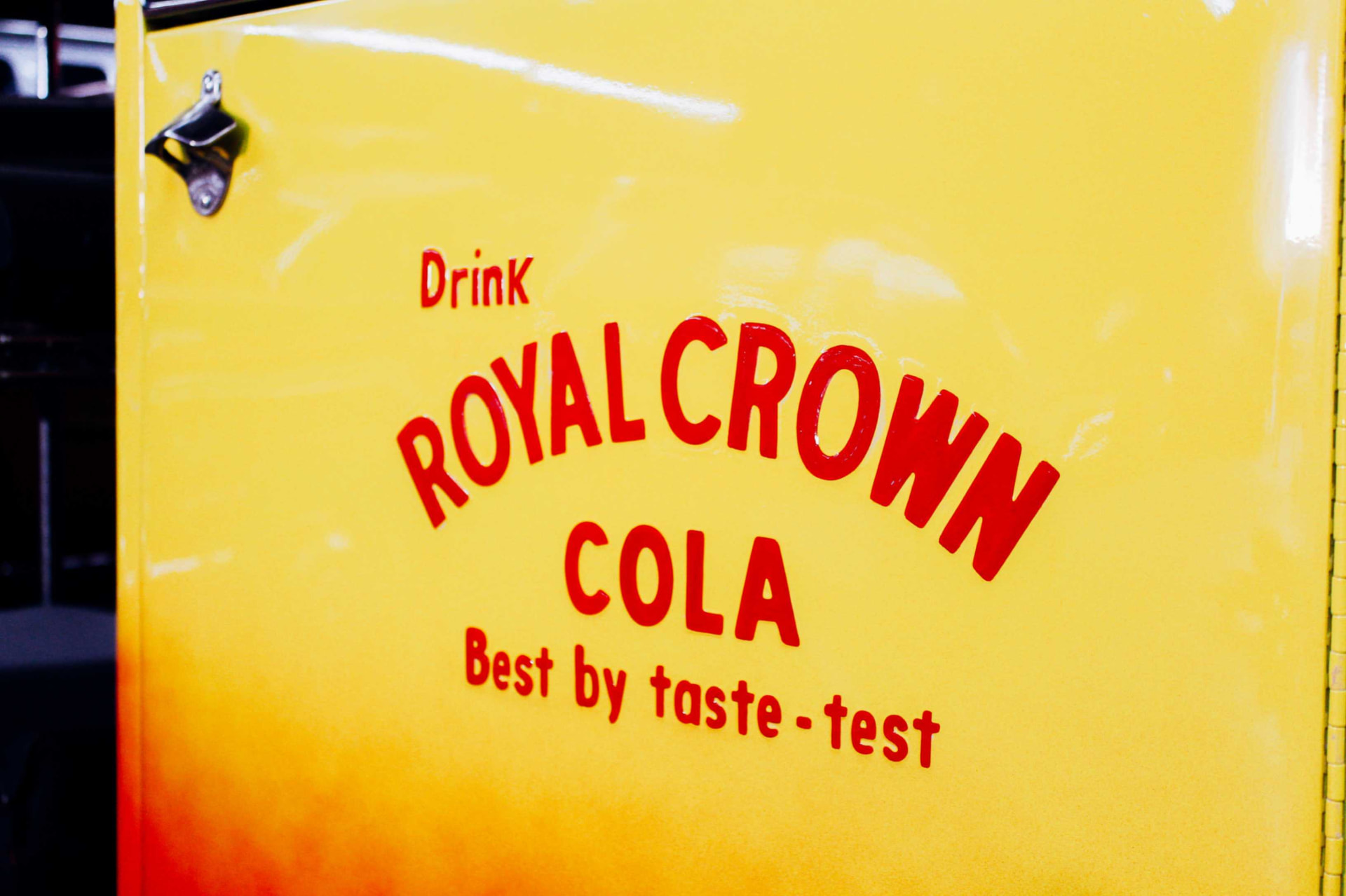Door detail: Royal Crown Cola lettering with the attached bottle opener
