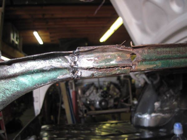 Corroded body brace exposed for repair