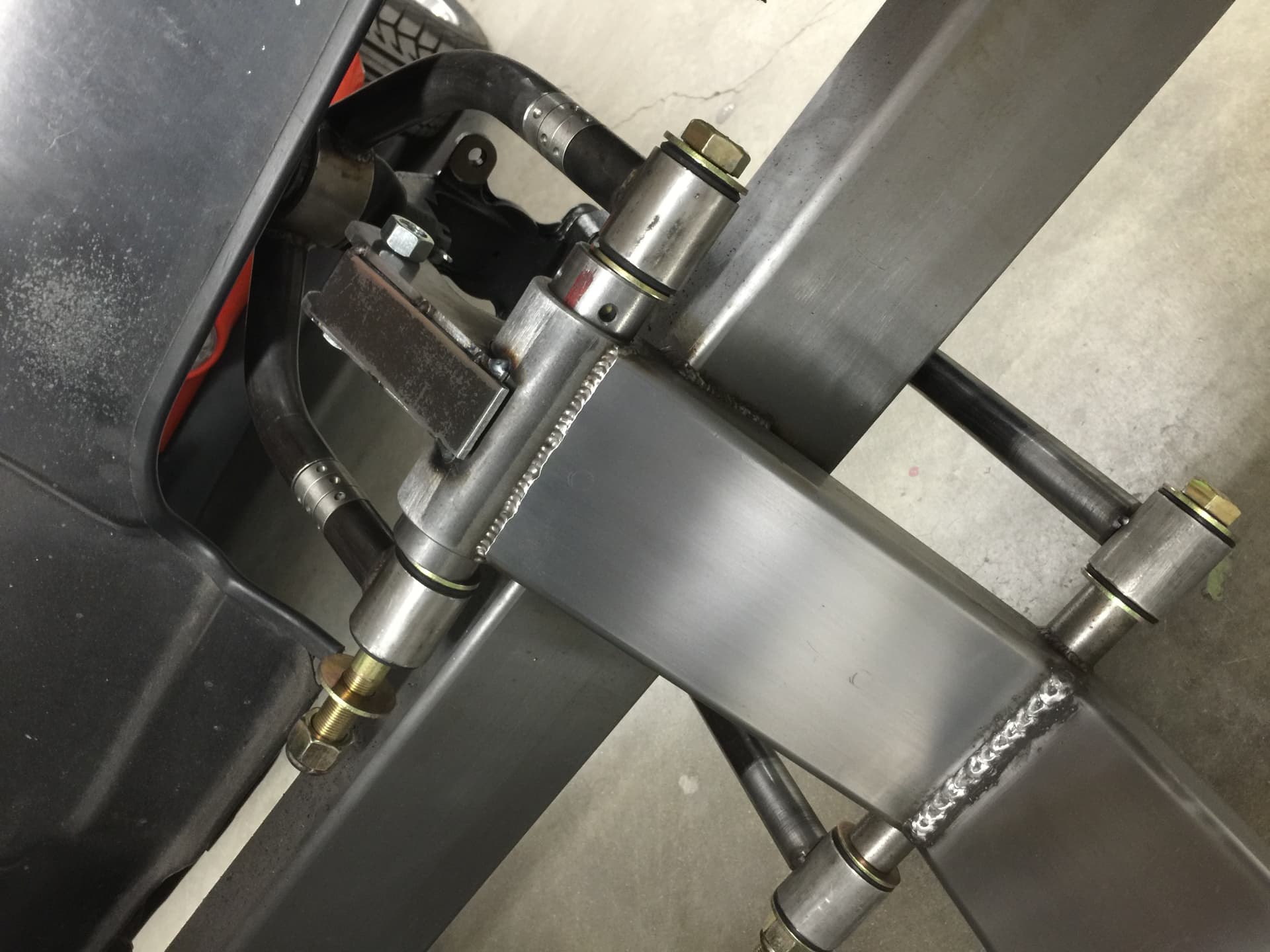 Front suspension and control arm fabrication