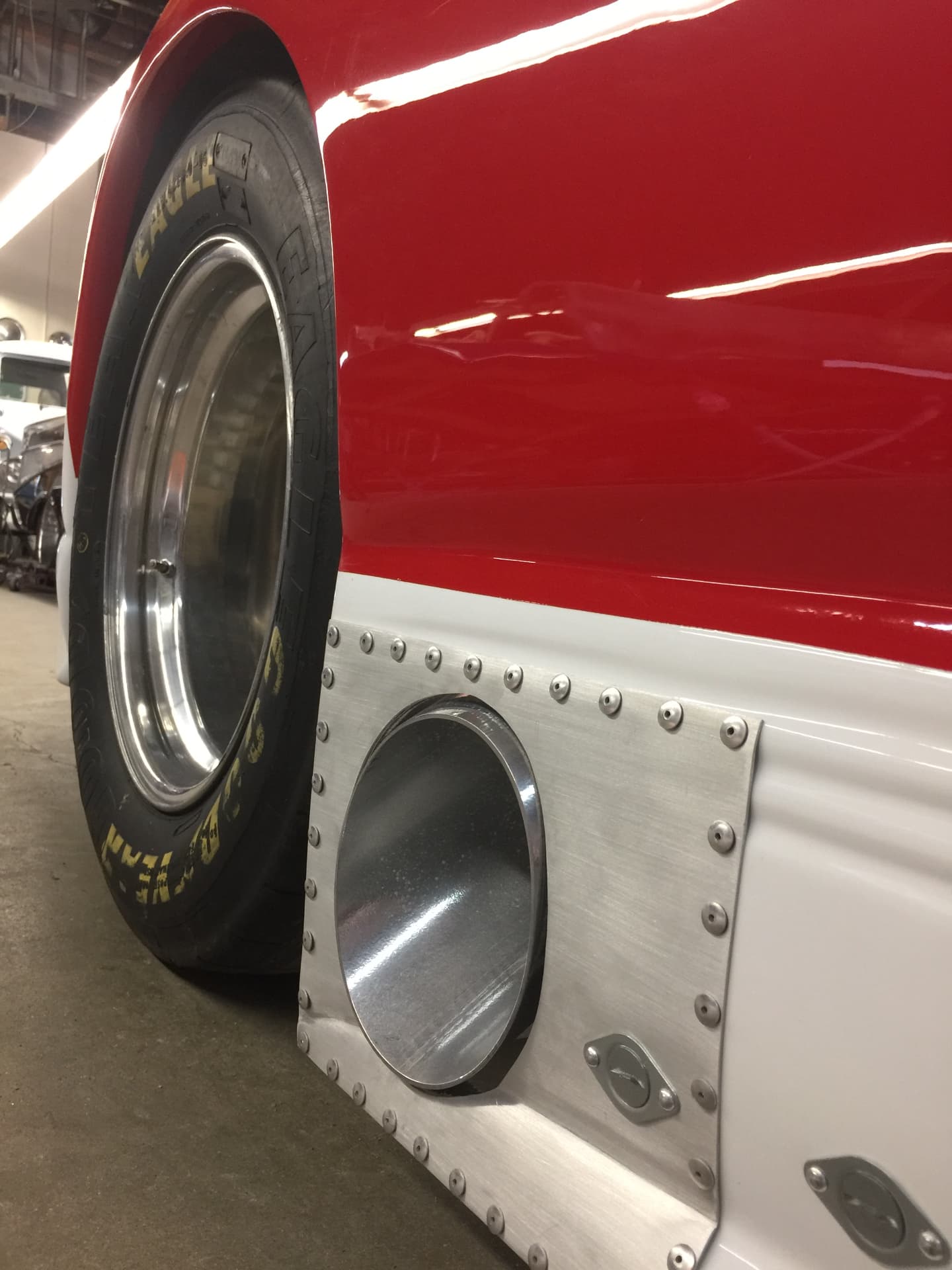 Restored wheel, tire, and brake-duct detail