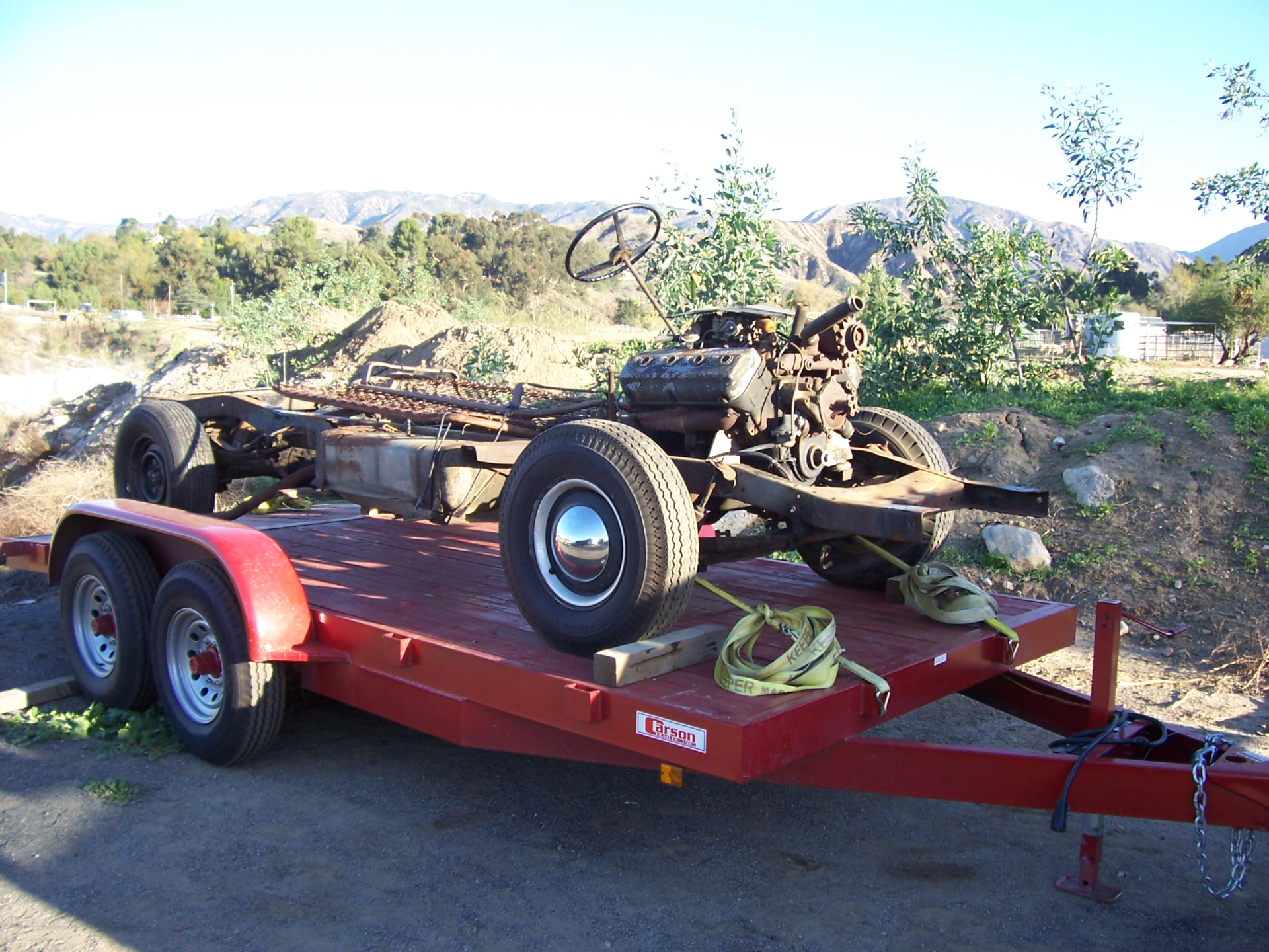 Original chassis arriving on the trailer