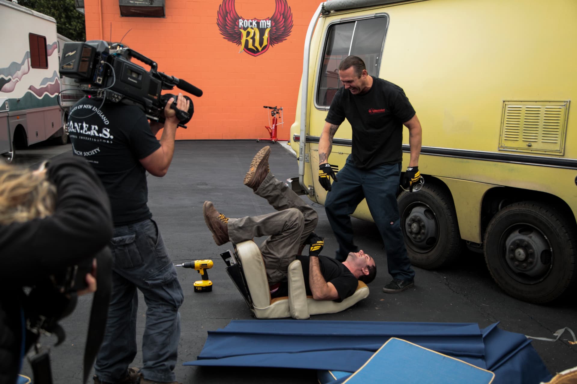 Crew filming a gag with the Rock My RV backdrop