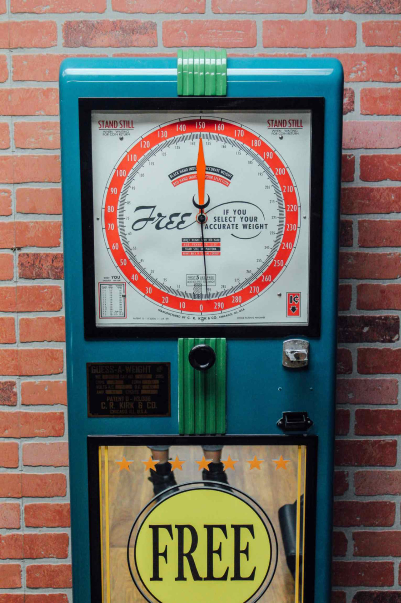 Front view with Guess-A-Weight plaque and mirrored panel