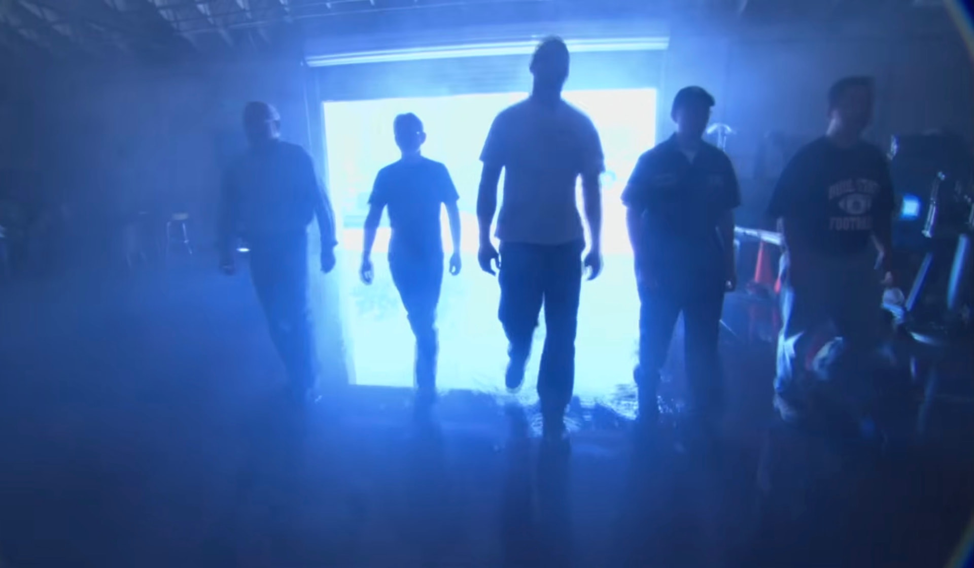 Monster Garage team entering the workshop