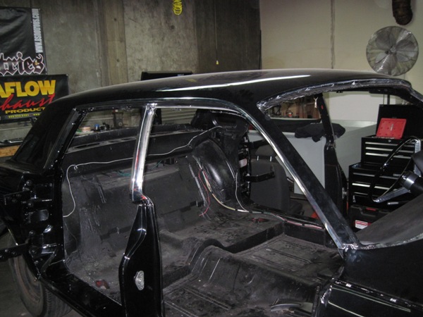 Bare interior shell with chrome trim mocked in place