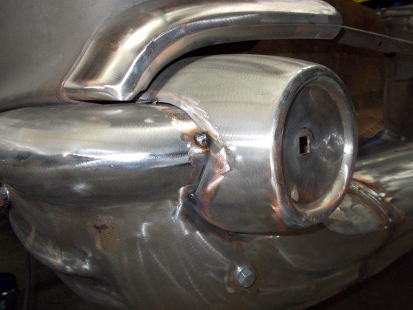 Rear bumper and bracket metalwork polished to bare metal