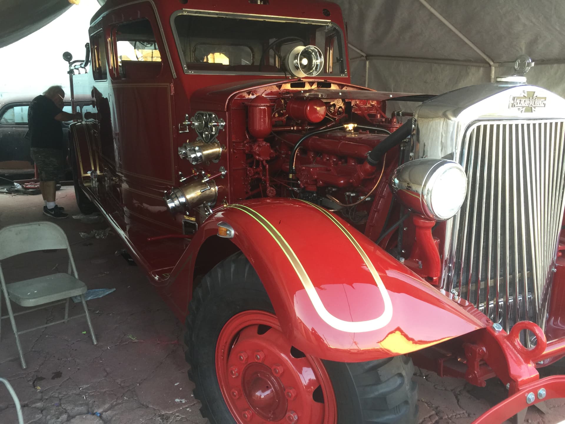Final assembly under the tent — engine and pump plumbing in place
