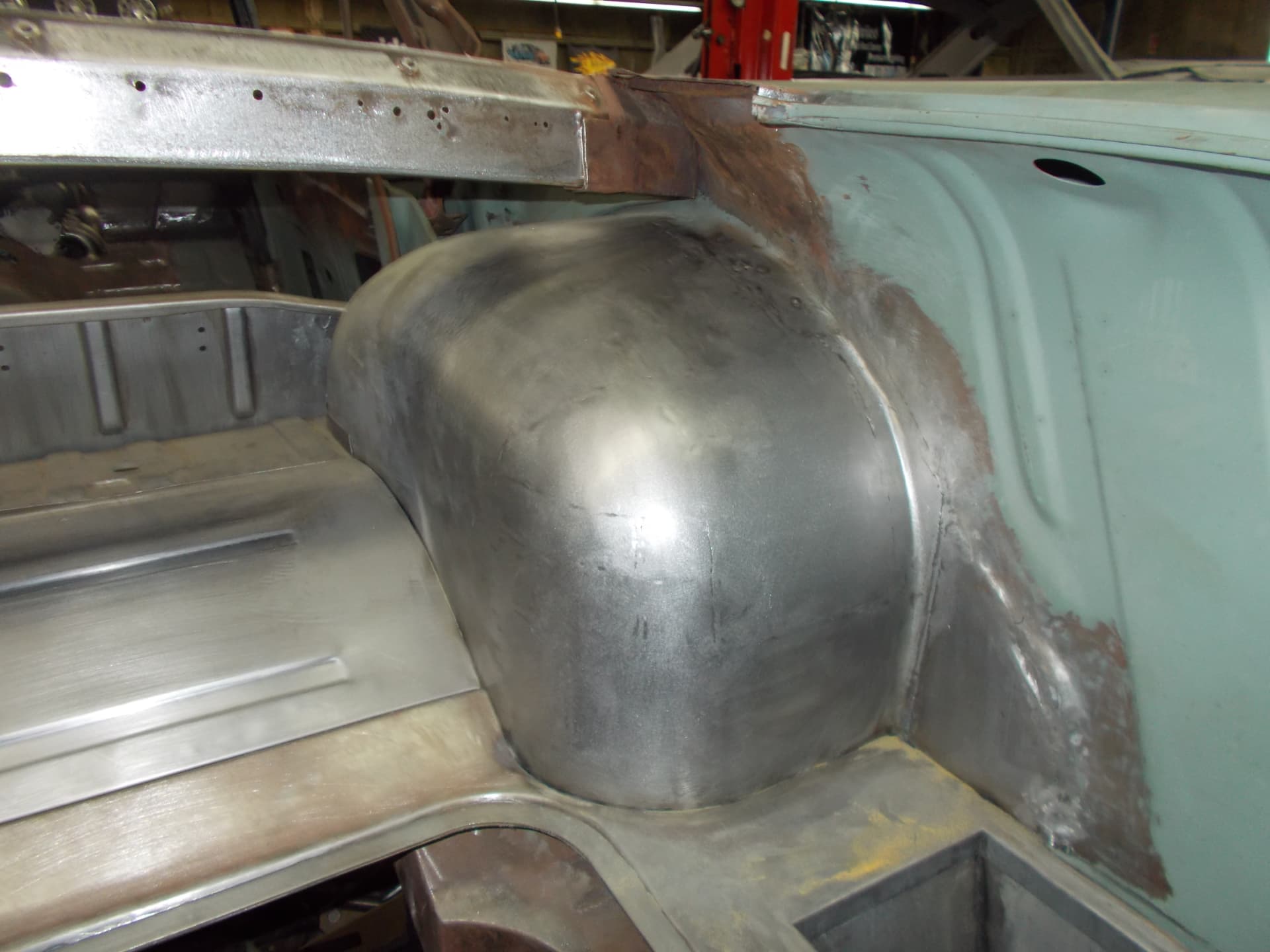 Hand-formed rear wheel-tub fabrication