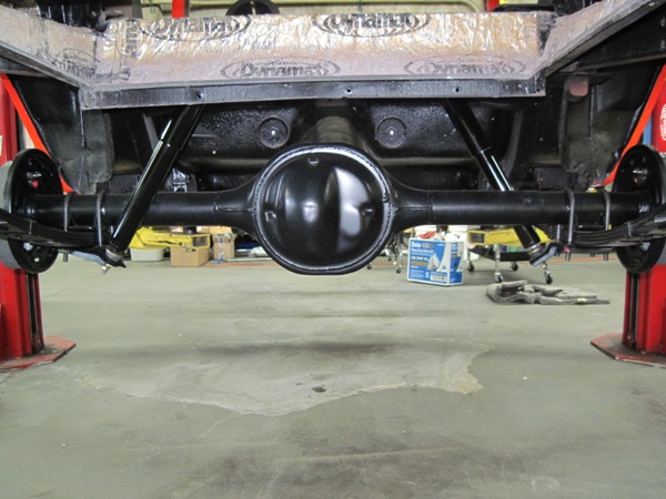 Underside detail — rebuilt rear axle and Dynamat-lined floor