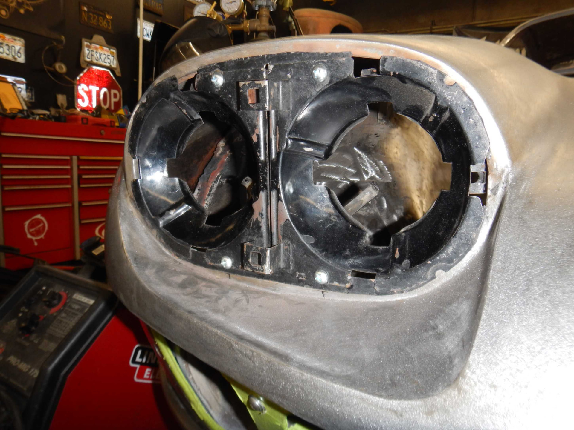 Quad headlight housings during front-end assembly
