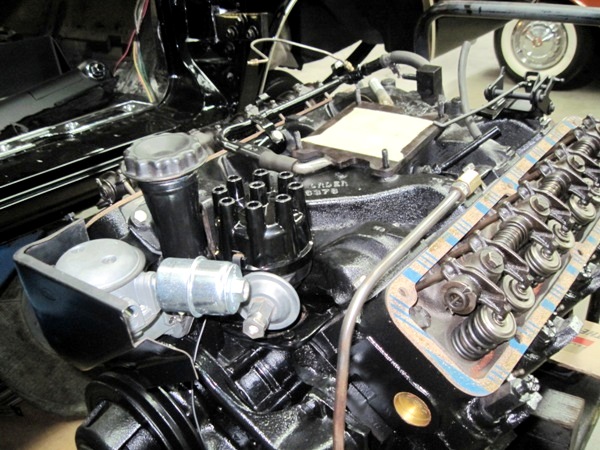 Engine teardown — valvetrain and distributor during the rebuild