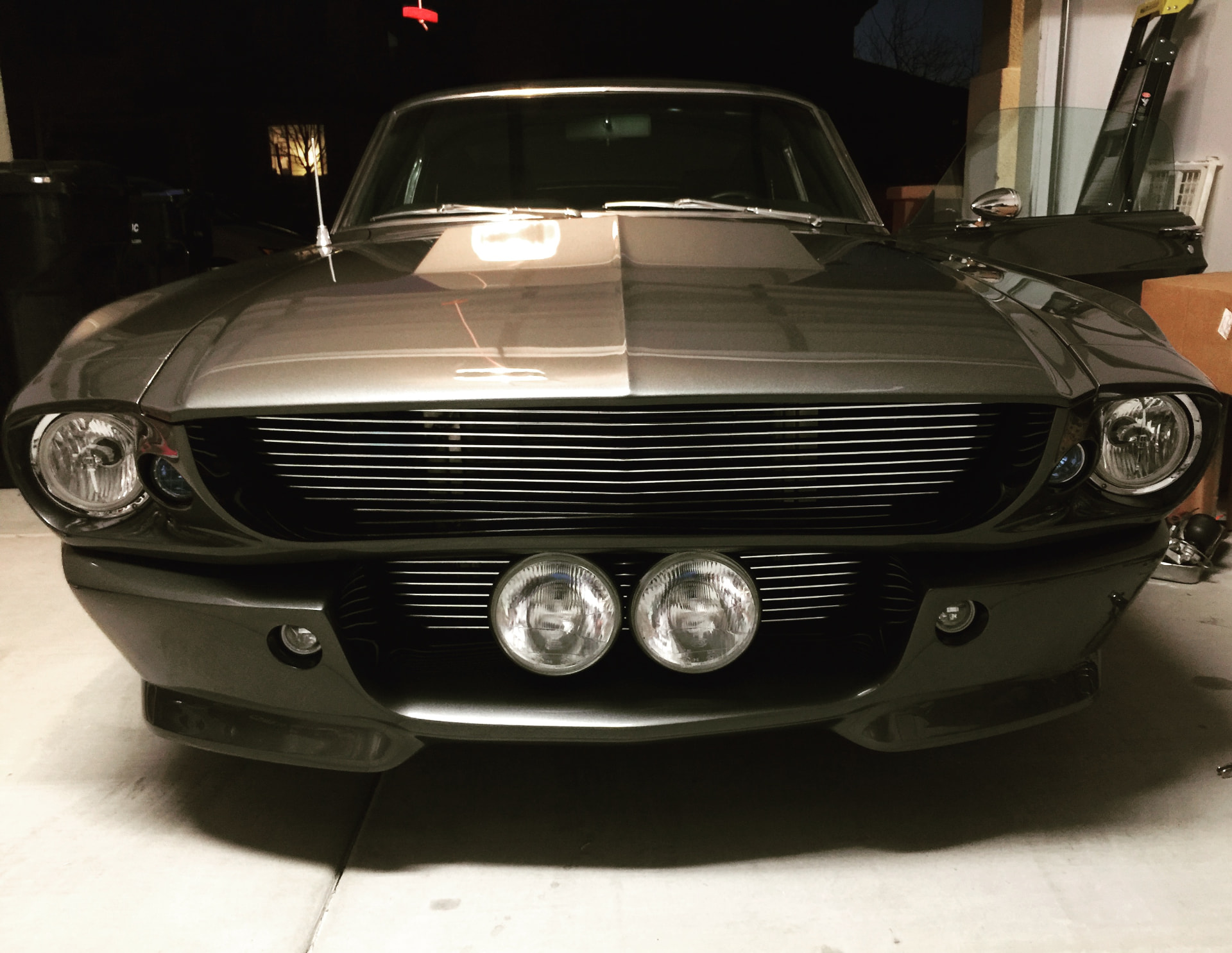 Front view showing the completed grille and driving lights