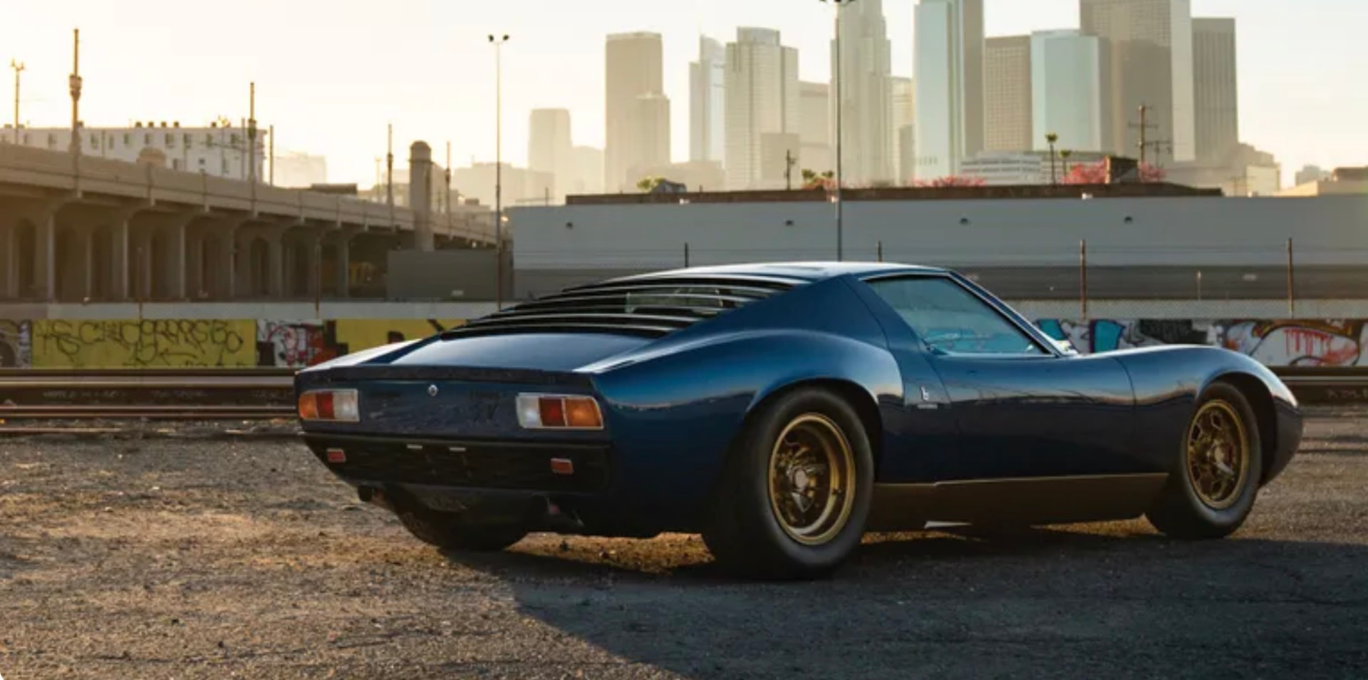 Blue Miura rear three-quarter view in downtown Los Angeles