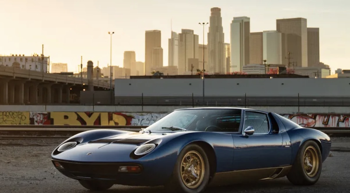 Blue Miura front three-quarter view in downtown Los Angeles