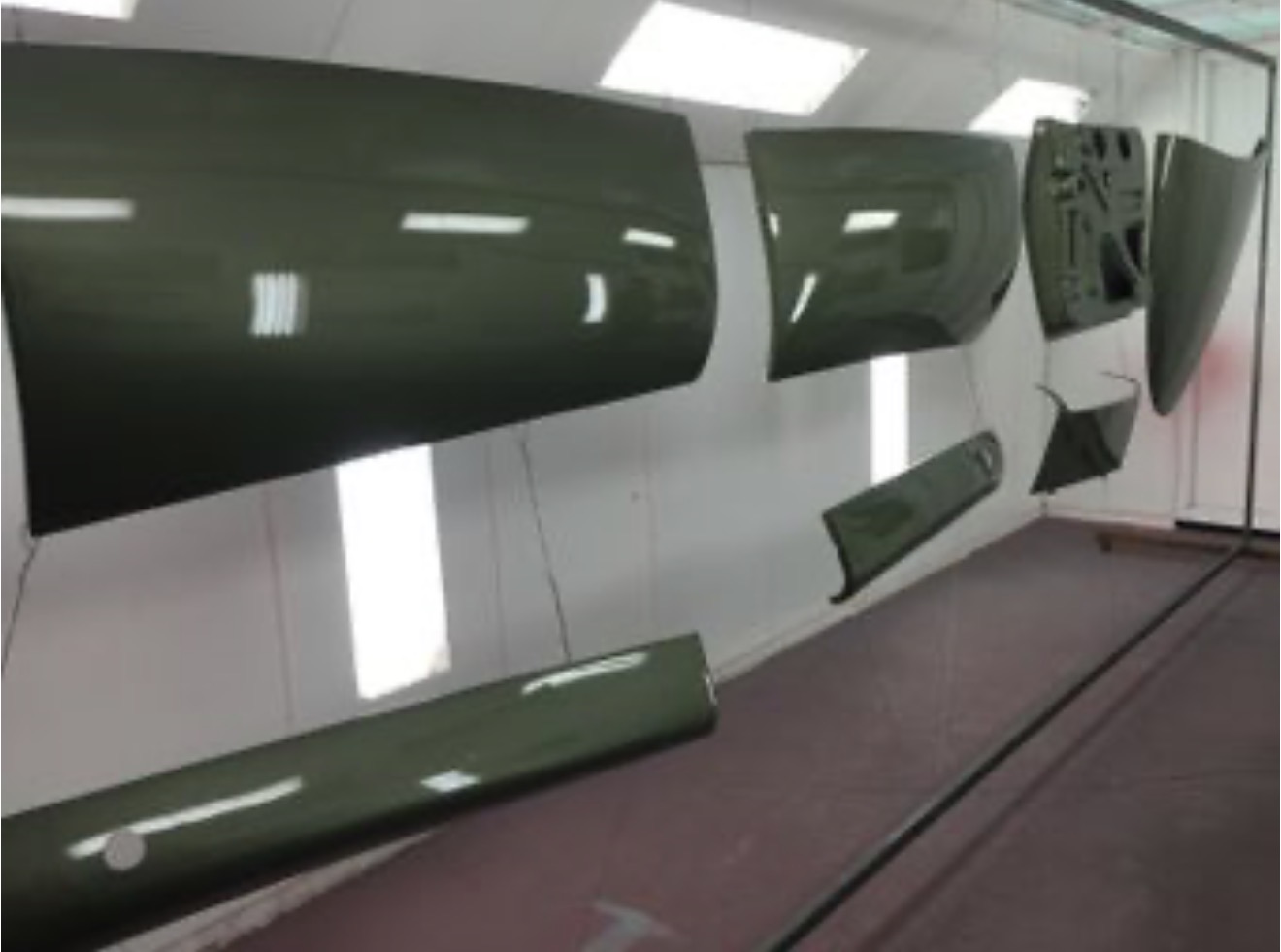 Davis Divan body panels in paint booth