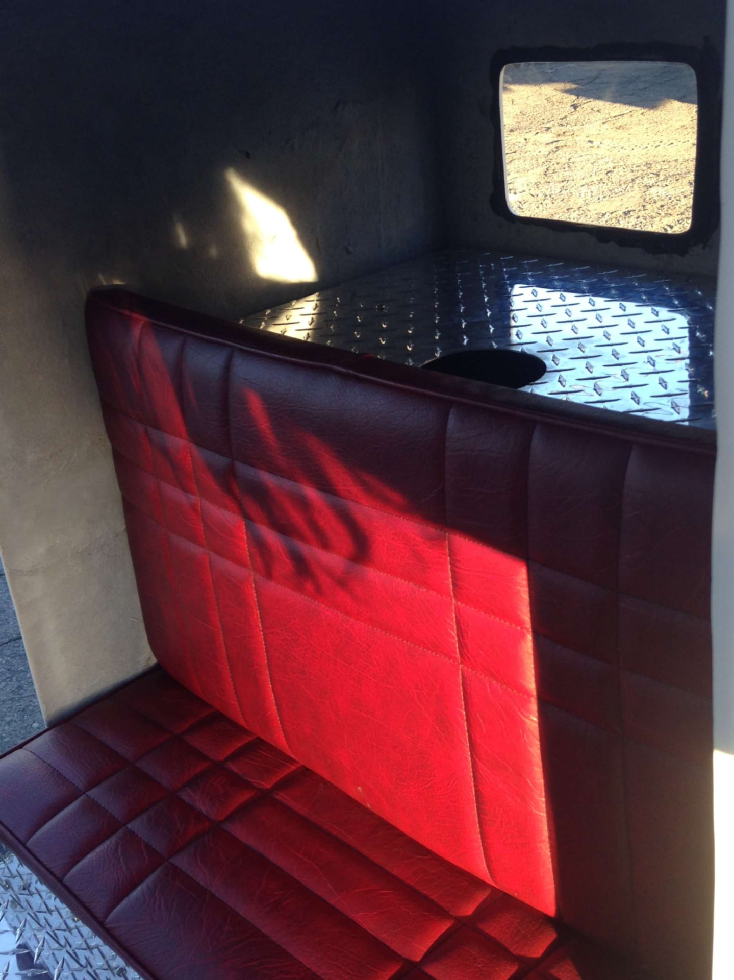 Red tufted bench seat interior