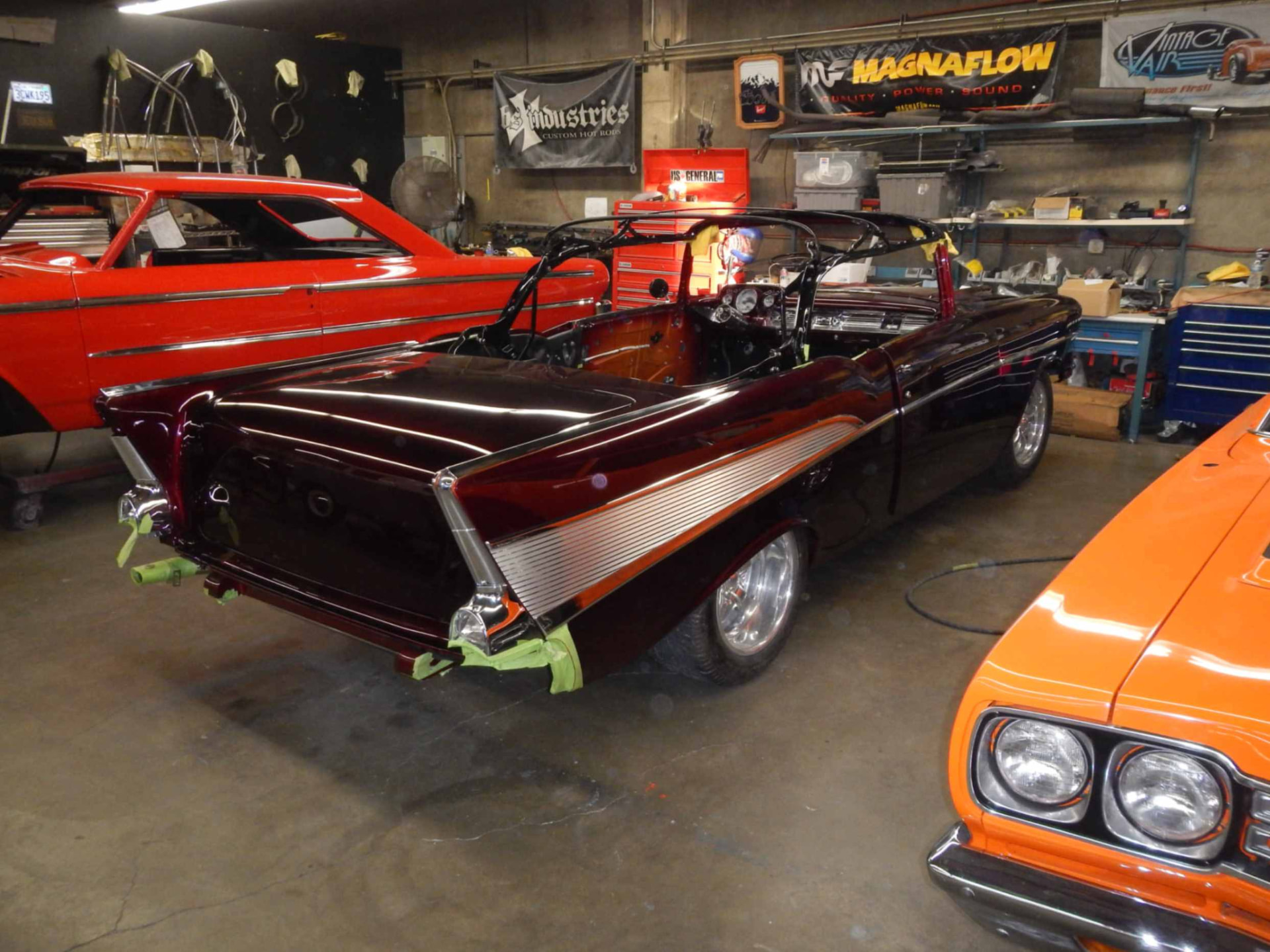 Rear three-quarter with the convertible top frame fitted and chrome protected
