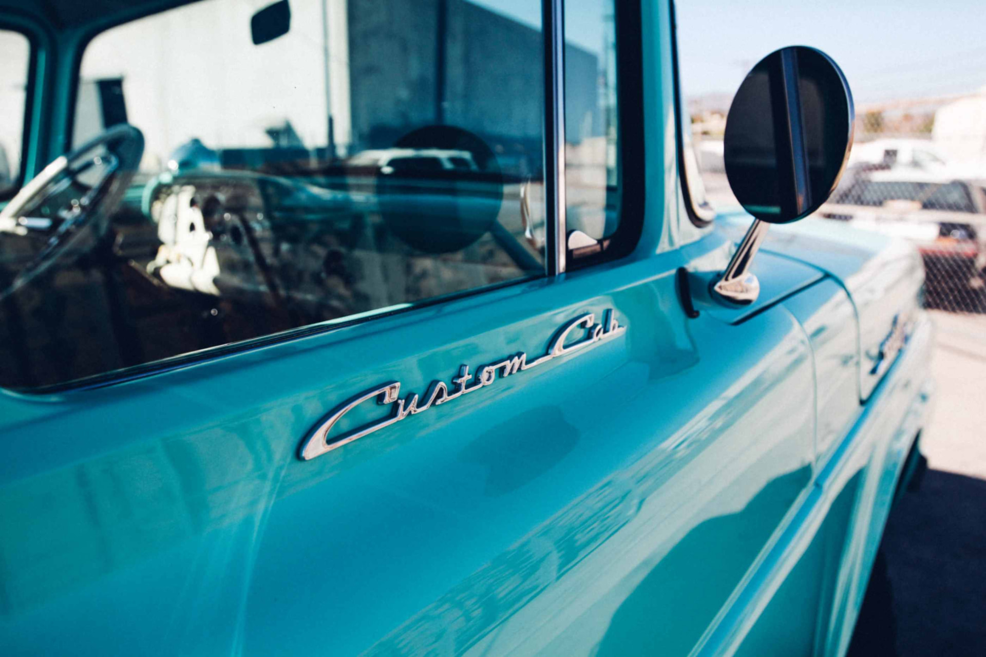 Custom Cab script badge and round mirror on the door