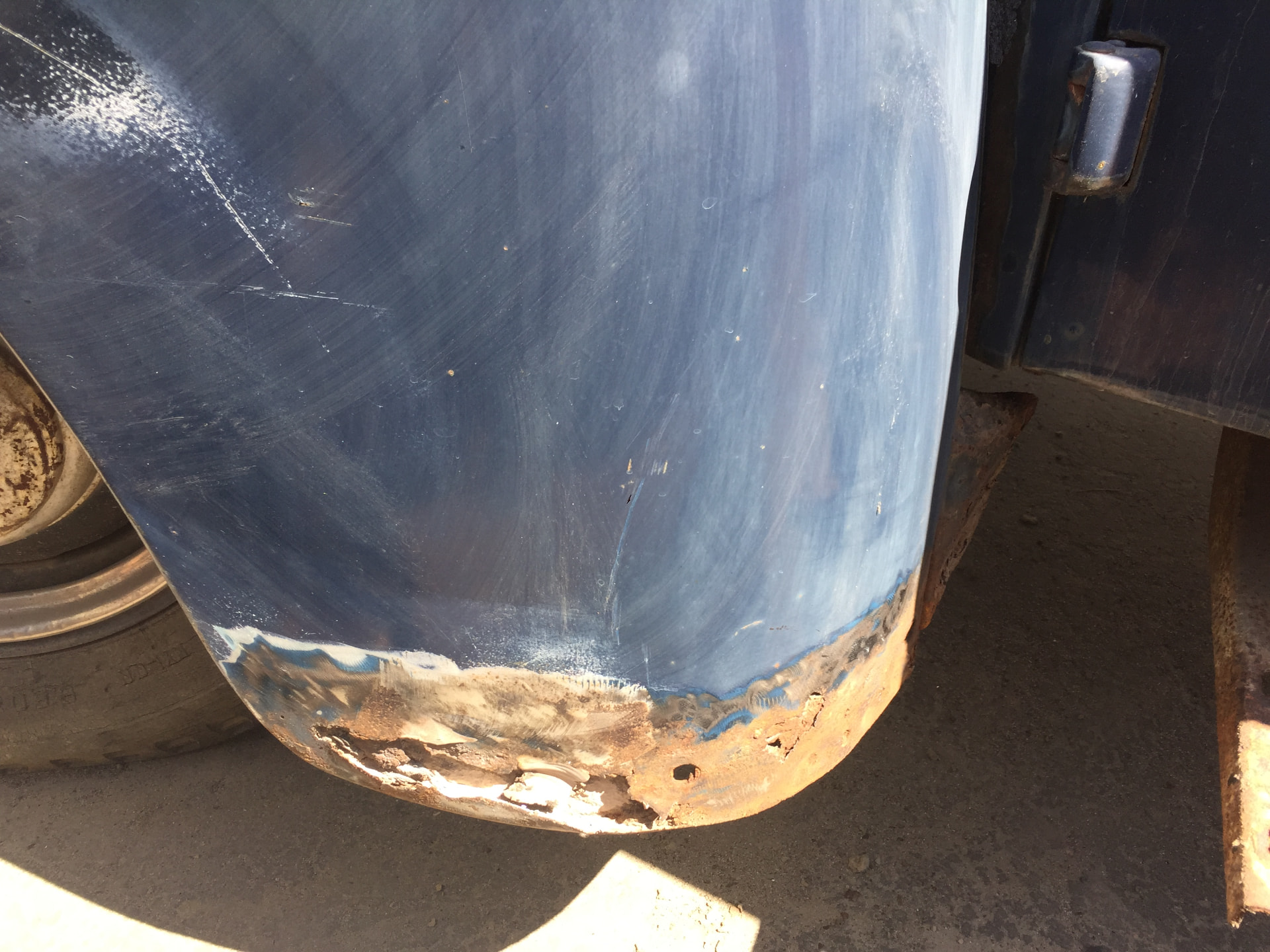 Front fender rust repair preparation