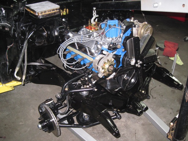 Engine and front suspension mocked up in the frame