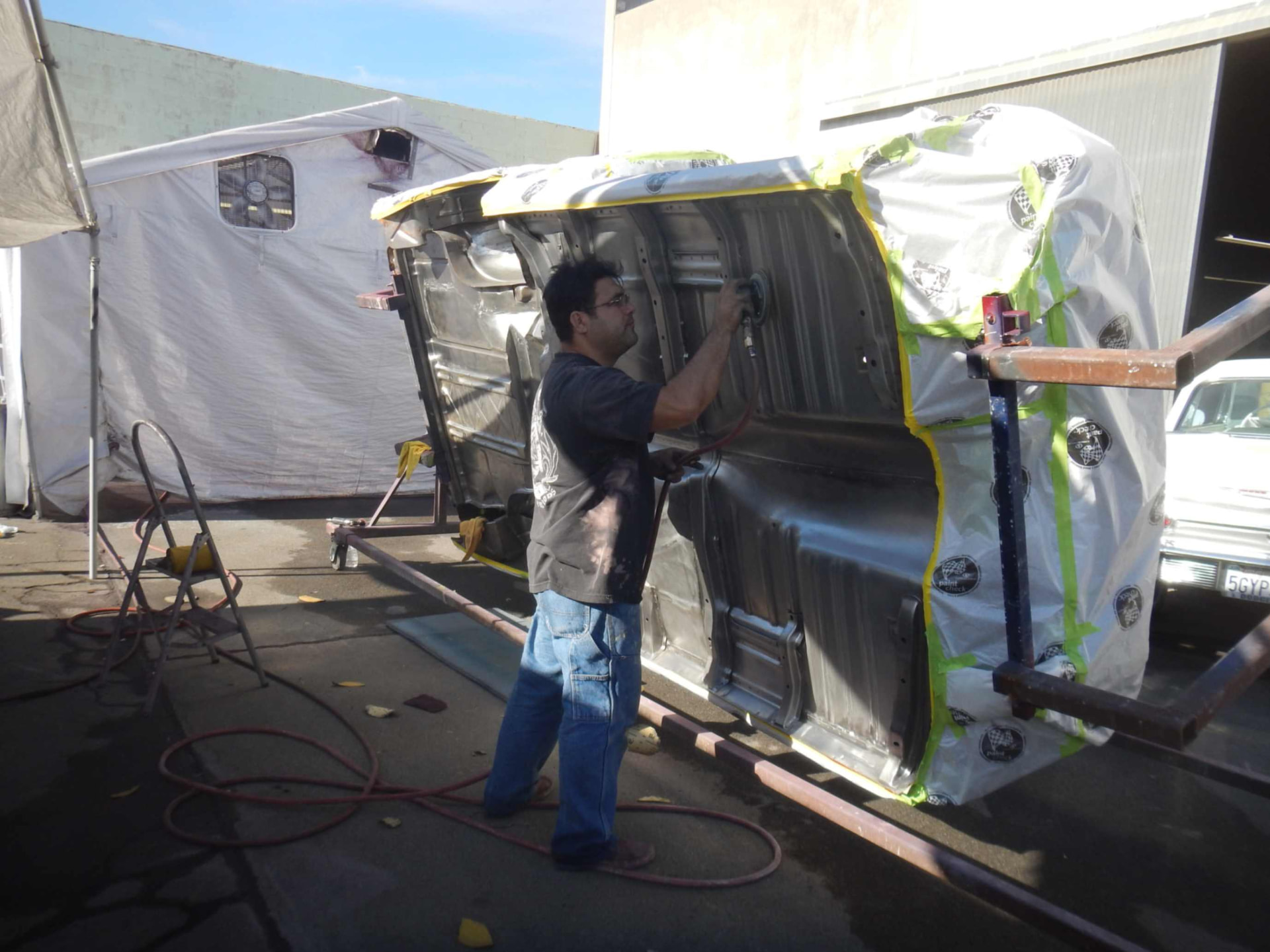Sanding the body on the rotisserie