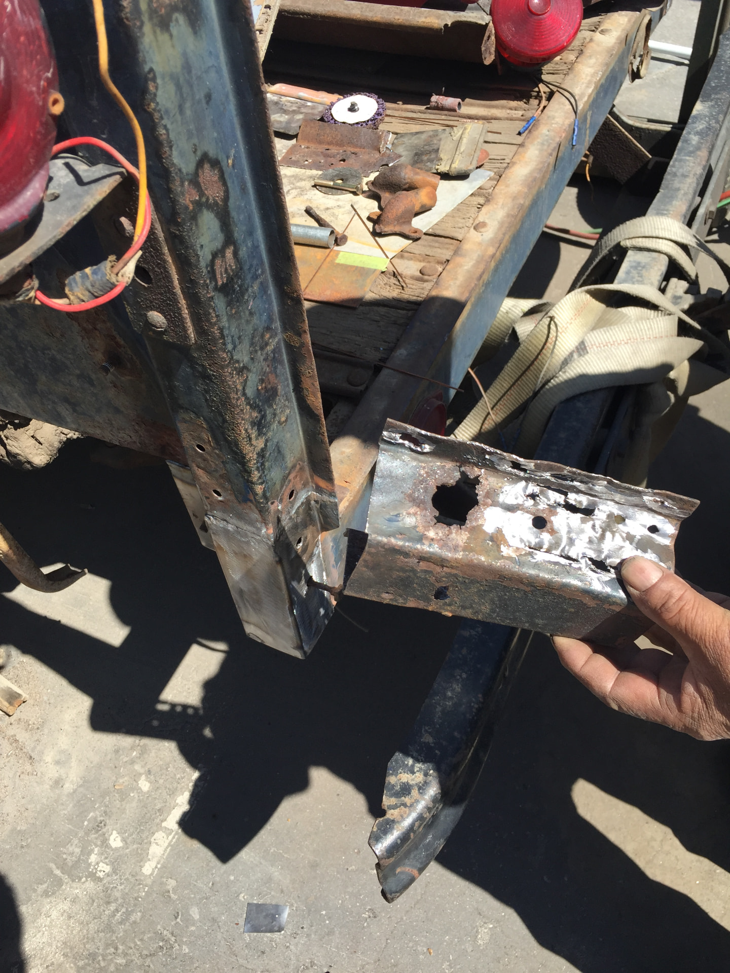 Corroded body section removed during metal repair