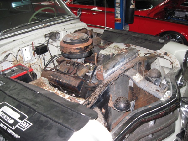 Original Cadillac engine bay before restoration